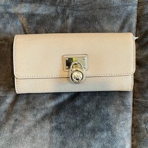 Michael Kors checkbook wallet.
